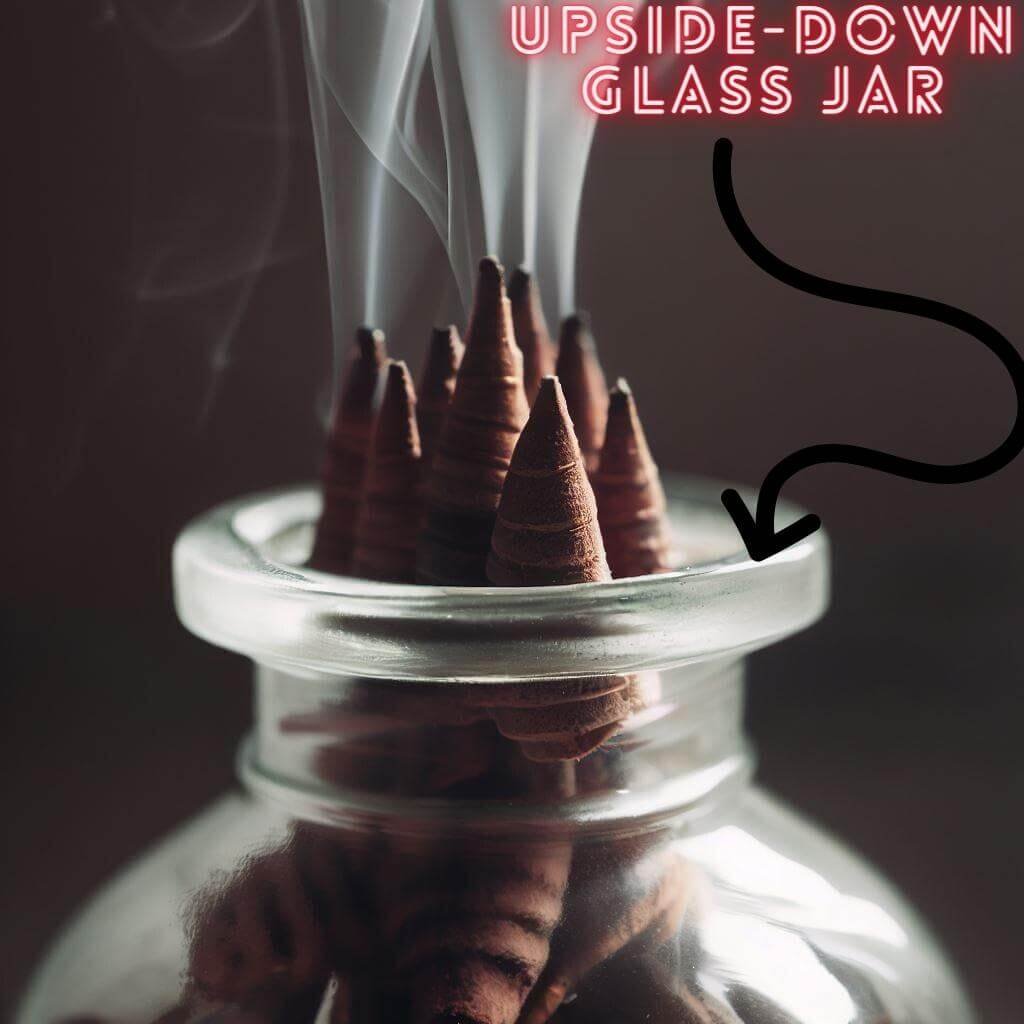 incense cone in upside-down glass jar